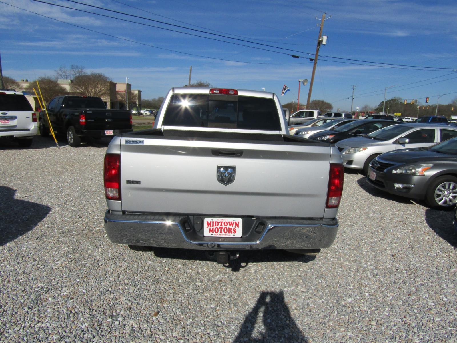 2013 Silver RAM 1500 SLT Crew Cab 2WD (1C6RR6LG9DS) with an 3.6L V6 engine, Automatic transmission, located at 15016 S Hwy 231, Midland City, AL, 36350, (334) 983-3001, 31.306210, -85.495277 - Photo #6
